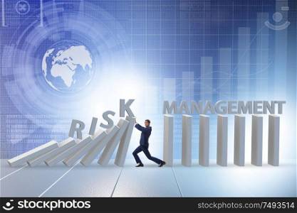 The businessman in risk management concept. Businessman in risk management concept