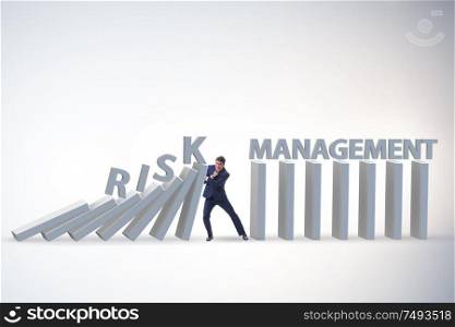The businessman in risk management concept. Businessman in risk management concept