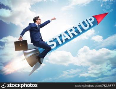The businessman in start-up concept flying on rocket. Businessman in start-up concept flying on rocket