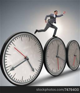 The businessman in time management concept. Businessman in time management concept