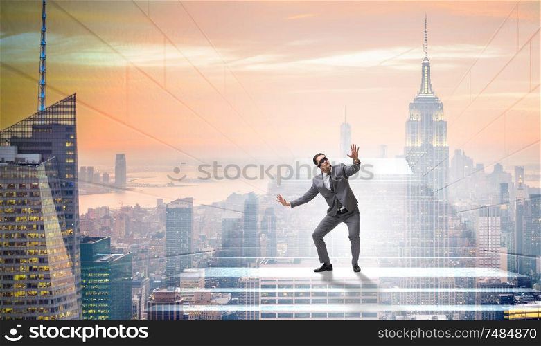 The businessman in uncertainty concept on career ladder. Businessman in uncertainty concept on career ladder