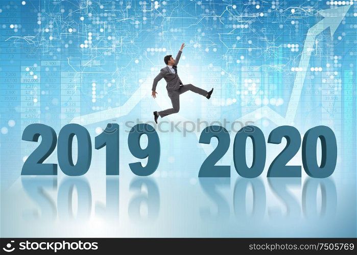 The businessman jumping from year 2019 to 2020. Businessman jumping from year 2019 to 2020