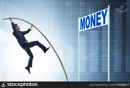 The businessman jumping over money in business concept. Businessman jumping over money in business concept