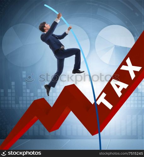 The businessman jumping over tax in tax evasion avoidance concept. Businessman jumping over tax in tax evasion avoidance concept