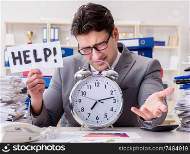 The businessman missing deadlines due to excessive work. Businessman missing deadlines due to excessive work