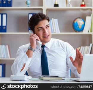 The businessman operator agent working in the office. Businessman operator agent working in the office