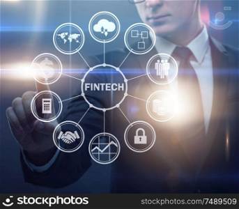 The businessman pressing buttons in fintech concept. Businessman pressing buttons in fintech concept