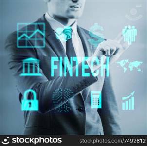 The businessman pressing buttons in fintech concept. Businessman pressing buttons in fintech concept