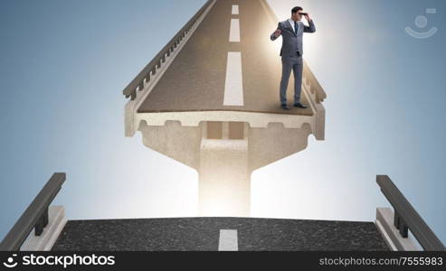 The businessman ready to overcome the broken bridge. Businessman ready to overcome the broken bridge