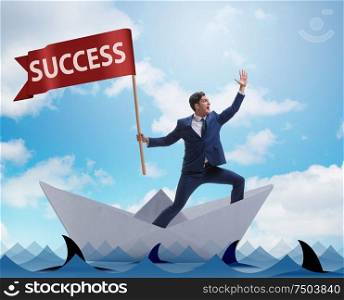 The businessman riding paper boat ship in success concept. Businessman riding paper boat ship in success concept