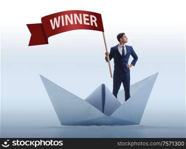 The businessman riding paper boat ship in winning concept. Businessman riding paper boat ship in winning concept