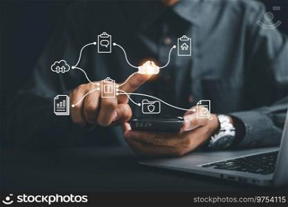 The businessman’s hand points to the cloud icon, symbolizing the solution and connectivity offered by cloud technology document. Explore the digital landscape of a business service on the internet.. The businessman’s finger points to the cloud icon