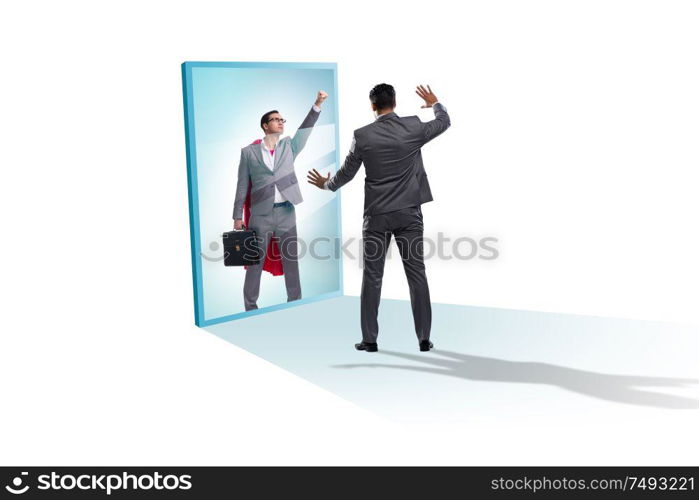 The businessman seeing himself in mirror as superhero. Businessman seeing himself in mirror as superhero