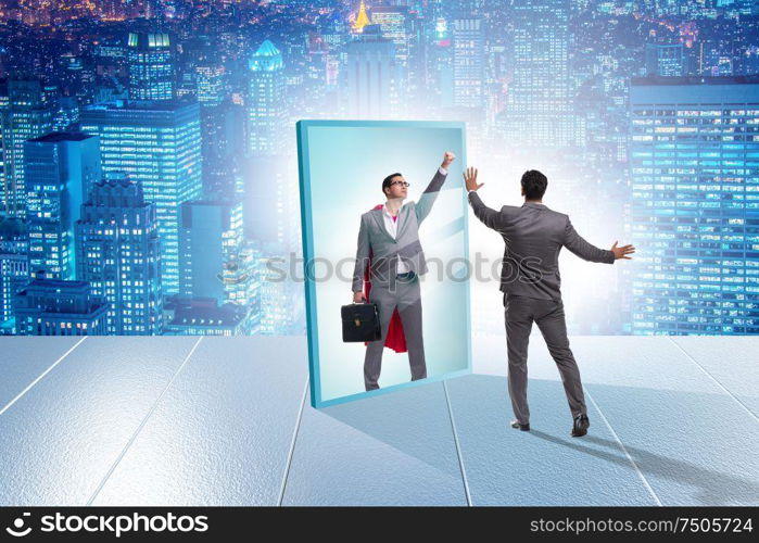 The businessman seeing himself in mirror as superhero. Businessman seeing himself in mirror as superhero