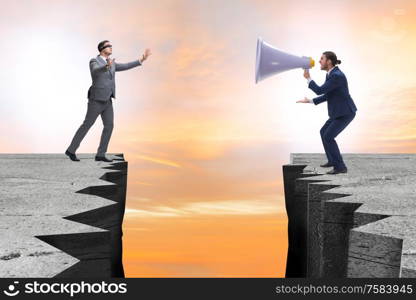 The businessman shouting with loudspeaker at others. Businessman shouting with loudspeaker at others