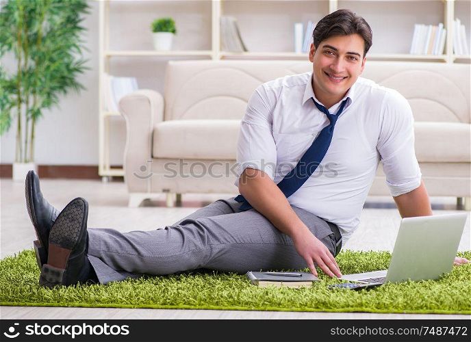 The businessman sitting on the floor in office. Businessman sitting on the floor in office