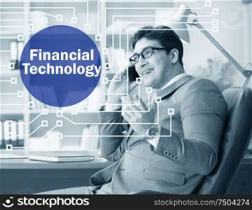 The businessman talking on smartphone in fintech concept. Businessman talking on smartphone in fintech concept