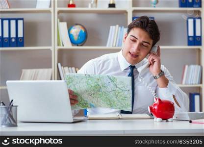 The businessman traveling agent working in the office. Businessman traveling agent working in the office
