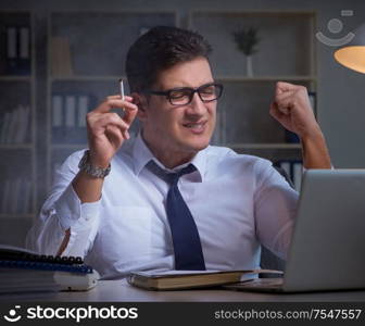 The businessman under stress smoking in office. Businessman under stress smoking in office