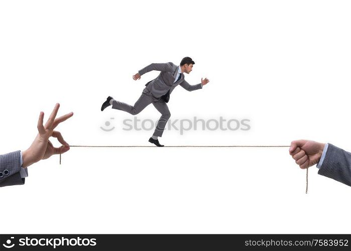 The businessman walking on tight rope. Businessman walking on tight rope