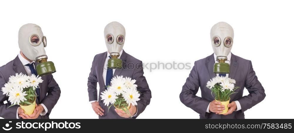 The businessman wearing gas mask isolated on white. Businessman wearing gas mask isolated on white