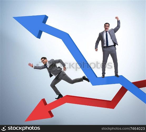 The businessman with charts of growth and decline. Businessman with charts of growth and decline