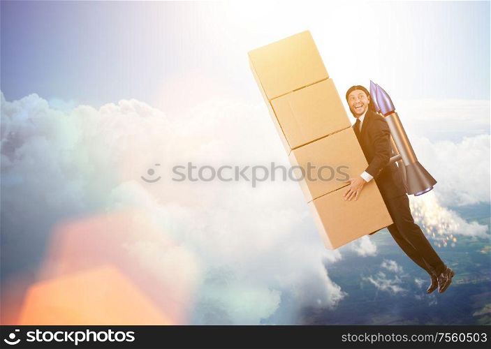 The businessman with jetpack delivering boxes globally. Businessman with jetpack delivering boxes globally