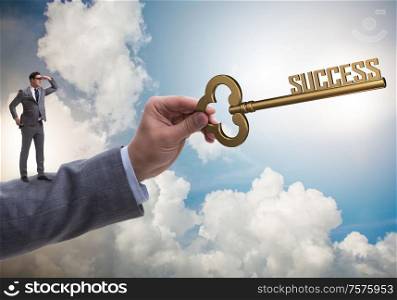 The businessman with key to success business concept. Businessman with key to success business concept