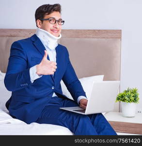 The businessman with neck injury working from home. Businessman with neck injury working from home