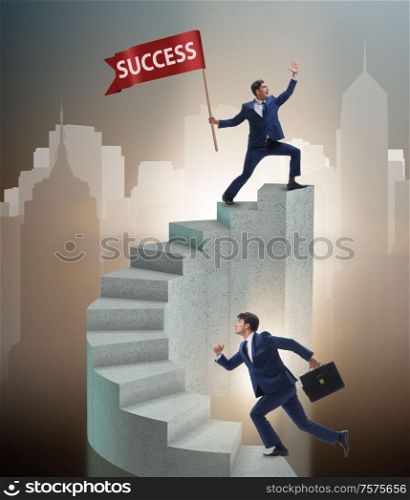 The businessman with success banner in business concept. Businessman with success banner in business concept