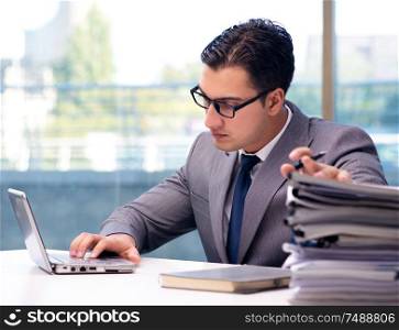 The businessman working in the office. Businessman working in the office
