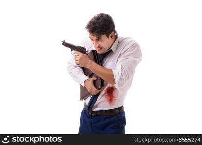 The businessman wounded in gun fight isolated on white. Businessman wounded in gun fight isolated on white