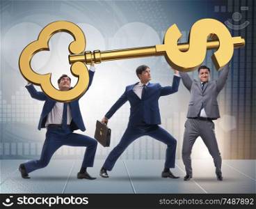 The businessmen holding giant key in finance concept. Businessmen holding giant key in finance concept