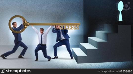 The businessmen in business success concept with key. Businessmen in business success concept with key