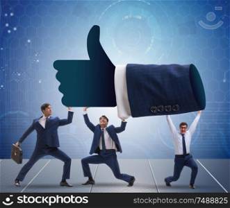 The businessmen supporting thumbs up gesture. Businessmen supporting thumbs up gesture