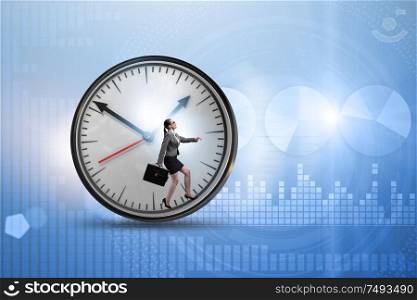 The businesswoman employee in time management concept. Businesswoman employee in time management concept
