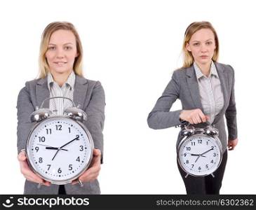 The businesswoman in gray suit holding alarm clock isolated on white. Businesswoman in gray suit holding alarm clock isolated on white
