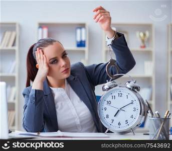 The businesswoman in time management concept. Businesswoman in time management concept