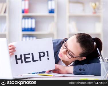 The businesswoman pleading for help in office. Businesswoman pleading for help in office