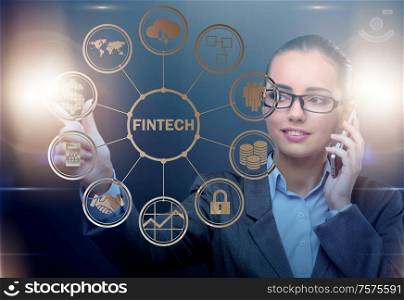 The businesswoman pressing buttons in fintech concept. Businesswoman pressing buttons in fintech concept