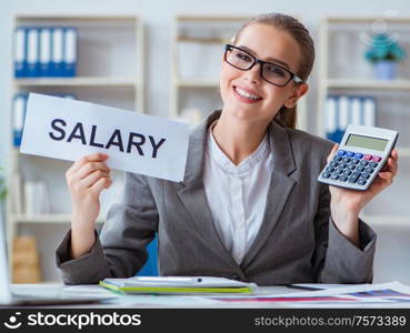 The businesswoman sitting in office with message. Businesswoman sitting in office with message