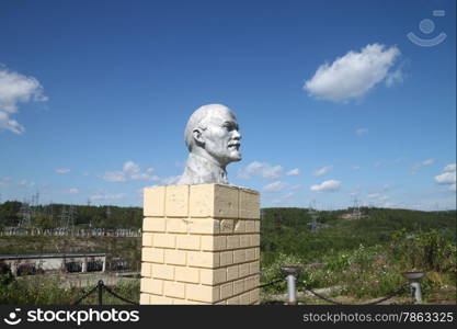 The bust of Lenin on the background of power lines