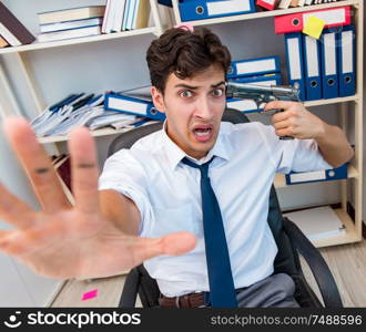 The busy frustrated businessman angry in the office. Busy frustrated businessman angry in the office