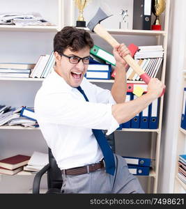 The busy frustrated businessman angry in the office. Busy frustrated businessman angry in the office