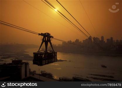 the cable car on the way over the yangzee River in the city of Chongqing in the province of Sichuan in china in east asia. . ASIA CHINA CHONGQING