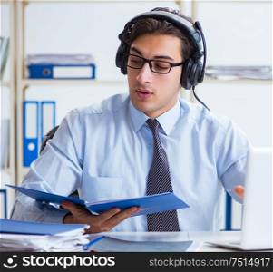 The call center operator talking to customer on live call. Call center operator talking to customer on live call