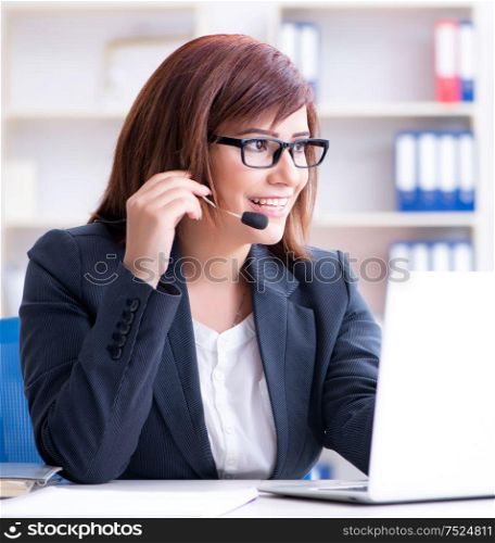 The call center operator working with clients. Call center operator working with clients