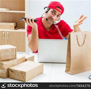 The call center worker at parcel distribution center in post office. Call center worker at parcel distribution center in post office