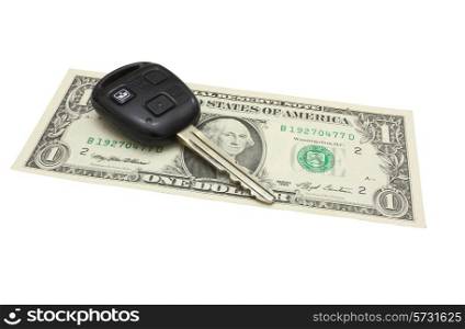 The car key lies on a dollar denomination isolated on white in a background&#xA;