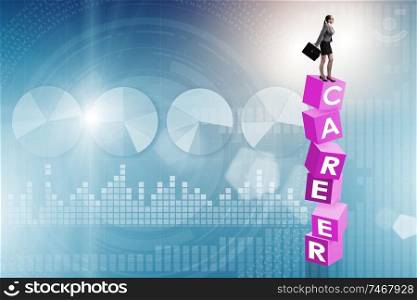 The career concept with businesswoman on top of blocks. Career concept with businesswoman on top of blocks